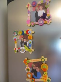 the refrigerator is decorated with family photos and magnets