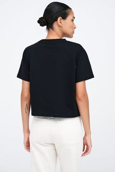 Our Rya Tee is for those who expect their basics to go above and beyond. Fashioned from French organic cotton jersey, she offers unrivaled softness and breathability in a cropped, oversized cut. With short sleeves and a rib-knit crew neck for visual interest, this classic tee works solo or as a base to create countless unique looks.[SPLIT] Astrid, in black, is 5'9" (175 cm) tall, wearing size XS. Rocio, in white, is 5'9.5" (175 cm) tall, wearing size XS. Total length is approximately 20" (51 cm) Boxy Short Sleeve Basic Cropped T-shirt, Casual Boxy Fit Cropped T-shirt With Short Sleeves, Relaxed Fit Cropped T-shirt For Everyday, Relaxed Fit Cropped T-shirt, Boxy Cropped T-shirt For Streetwear, Short Sleeve Tops With Ribbed Neckline For Streetwear, Short Sleeve Streetwear Tops With Ribbed Neckline, Solid Athleisure Cropped T-shirt, Solid Cropped T-shirt For Athleisure