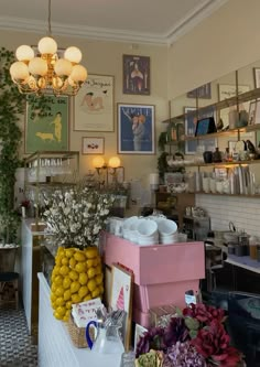 there are many items on the counter in this shop, including lemons and other things