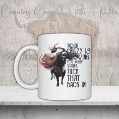 a coffee mug with a cow on it