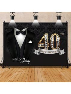 a black and white photo booth with the words hello forty birthday written in gold on it