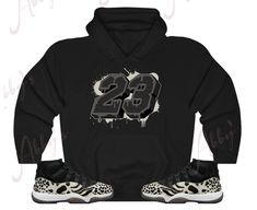 Custom Designed Sneaker Hoodie Hoodie Features 🔹 Drawstring Hood 🔹50% Cotton, 50% Polyester 🔹Runs True To Size 🔹Kangaroo Pouch Pocket Shoes Not Included Custom Made - Not Adidas, Nike, or Jordan Brand Sneaker Tee, Sneaker T-Shirt The sneakers/shoes are not being sold in this product. You are only purchasing the tshirt/hoodie/sock/sweatshirt/tank top shown. Shoes are NOT included. The shoes displayed are sold separately elsewhere and are only used for marketing purposes. We are displaying the Air Jordan 11 Animal Instinct, Pocket Shoes, Jordan Retro 11 Low, Air Jordan Retro 4, Air Jordan Retro 11, Jordan Retro 12, Jordan Retro 11, Animal Instinct, Jordan Retro 4