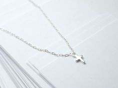 <3 <3 Tiny silver cross necklace - small cross necklace - sterling silver - dainty delicate Silver Cross Necklace With Delicate Chain, Silver Charm Necklace With Cross Pendant, Silver Charm Necklace With Cross Pendant And Delicate Chain, Minimalist Silver Cross Pendant Charm Necklace, Minimalist Silver Charm Necklace With Cross Pendant, Silver Sterling Cross Necklace With Delicate Chain, Sterling Silver Cross Necklace With Delicate Chain, Dainty Sterling Silver Cross Pendant Charm Necklace, Small Cross Necklace