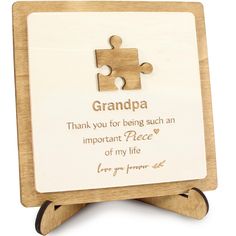 a wooden frame with a puzzle piece on it that says, grandpa thank you for being such an important piece of my life