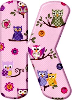 the letter k is decorated with owls and flowers