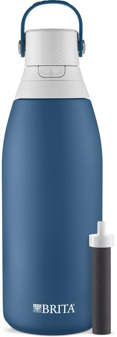 a blue and white water bottle next to an empty canister