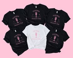 five t - shirts with the words team bride and wine glasses on them in pink