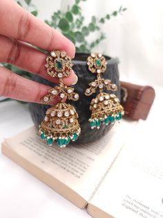 Fine Victorian Kundan Jhumka with CZ stones and uncut Polki Kundan stones Surely a statement Jhumka earringThe earring has very fine quality and craftmanship and also has a very elegant look pictures cannot do justice to how beautiful this jhumka earrings is . Brass Chandbalis For Wedding, Brass Bridal Earrings With Latkans For Wedding, Bridal Brass Earrings With Latkans For Wedding, Wedding Bridal Earrings With Latkans In Brass, Elegant Tilla Danglers For Eid, Heavy Chandbali Earrings In Brass, Heavy Chandbali Brass Earrings, Brass Jhumkas With Intricate Design For Wedding, Bollywood Brass Danglers For Wedding