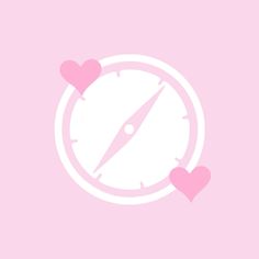 a pink clock with two hearts on it