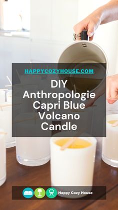 someone is pouring an anthropologie capri blue vocano candle