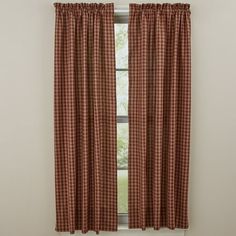 a window with a red and white checkered curtain