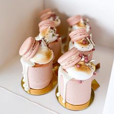 there are many desserts in the shape of macaroons on top of each other