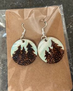 Wood burning done by hand. Wood Burned Earrings Diy, Woodburn Earrings, Wood Burnt Earrings, Nature-inspired Natural Wood Earrings As Gift, Brown Wood Drop Earrings, Wood Dangle Earrings, Laser Cut Wood Earrings, Laser Cut Wood, Wood Earrings