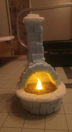 a small fireplace made out of foam on the floor