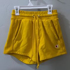 Brand: Champion Condition: New Without Tags Casual Yellow Drawstring Shorts, Yellow Cotton Shorts For Streetwear, Casual Yellow Athletic Shorts, Yellow Athleisure Shorts, Casual Yellow High-waisted Shorts, Yellow Pocket Shorts For Streetwear, Yellow Shorts With Pockets For Streetwear, Yellow Streetwear Shorts With Pockets, Yellow Drawstring Shorts