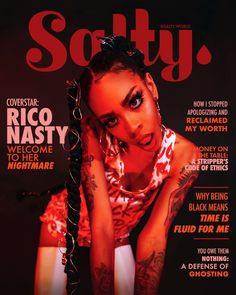 a magazine cover featuring a woman with tattoos on her face and hands behind her head