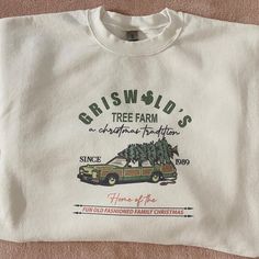 Griswold's Tree Farm Sweatshirt. The sweatshirt material is 50/50 cotton/polyester blend. Very stretchy and comfy material! Pretty true to size and good for layering, we do recommend sizing up if you plan to layer.   Please note that the colors may fade slightly after the first wash, making more of a vintage look.  Please allow for 1-2 week production time then 2-5 business days for standard shipping. Griswold Family, Griswold Family Christmas, Griswold Christmas, Vintage Christmas Sweaters, Tree Sweater, National Lampoons Christmas, Lampoons Christmas, National Lampoons Christmas Vacation, Cute Christmas Shirts