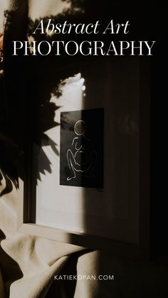 the shadow of a person sitting in front of a window with text that reads, abstract art photography