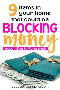 a pile of money with the words 9 items in your home that could be blocking money