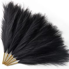 PRICES MAY VARY. Artificial Pampas Grass Chic Black- With pure minimalistic black, this faux pampas grass bouquet can bring you a feeling of stylish and chic. Making a certain aesthetic to the space. Perfect Vase Filler for Home Decor- Perfect size for short vases on tables. Length of the small pampas grass: 17.7 inch. One package has 6 stems. This gorgeous pompous bouquet is truly a nice choice for home decor, suitable for your living room, bathroom, bedroom, hallway, dining table or entry way. Black Pampas Grass Decor, Black Pampas, Faux Pampas, Grass Bouquet, Artificial Branches, Short Vase, Pampas Grass Bouquet, Grass Decor, Pampas Grass Decor