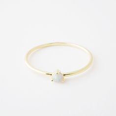 White Opal Dainty Birthstone Ring, White Dainty Opal Birthstone Ring, Adjustable Opal Birthstone Ring For Everyday, White Opal Birthstone Ring In Dainty Style, Dainty White Opal Birthstone Ring, Minimalist Everyday Opal Jewelry, Gold Dainty Opal Ring Birthstone, Adjustable 14k Gold Opal Birthstone Ring, Dainty Gold Opal Ring Birthstone