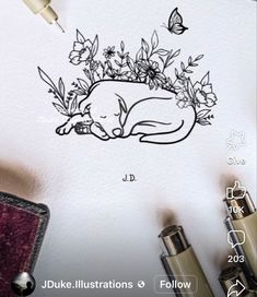 a drawing of a dog sleeping on top of a paper with flowers and butterflies around it