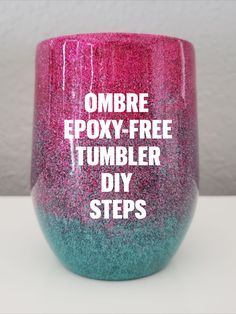 a pink and blue cup with the words ombre epoxy - free tumbler diy steps on it