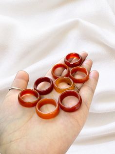 carnelian rings- please note before purchasing: these rings are hand carved so although I tried to size them as best I could each one is different and varies slightly- which means they might not fit the way you expect As this is a stone please be careful to avoid impact or drop as they can break! Rings are listed in US sizes Sizes 9-10 have thicker bands Used in ancient times to protect the dead in their journey to afterlife, Carnelian helps to calm the fears about death and rebirth, bringing se Carnelian Engagement Ring, Sacral Chakra Stones, Carnelian Ring, Boost Creativity, Sacral Chakra, Chakra Stones, Be Careful, Ancient Times, Crystals Minerals