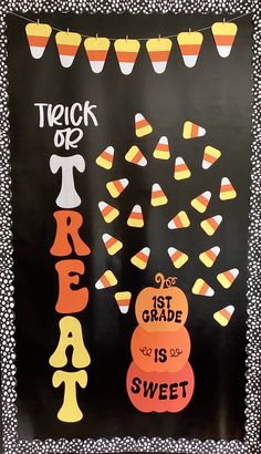 a trick or treat sign with candy corn on it