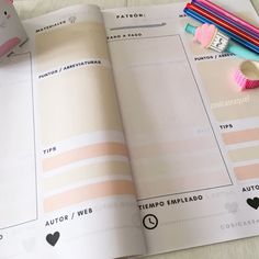 an open planner book with hello kitty stickers on the pages and other things to do