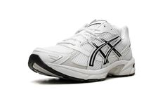 The ASICS Gel-1130 “Black/White” is another standout colorway of the retro performance running shoe.  The ASICS Gel-1130 was first released in 2008 and is now one of the most popular sneakers in the Y2K trend in sneaker culture.  On this colorway, the upper features a white mesh construction with tonal and light grey leather overlays.  ASICS’s classic tiger stripes are designed in white and accented in black  on either side of the shoe.  “ASICS” and “Gel-1130” branding are seen on the mesh tongu Asics Running Shoes With Vented Sides For Light Sports, Asics Running Shoes With Vented Sides For Streetwear, Asics Sporty Running Shoes With Vented Sides, Asics Running Shoes With Cushioned Midsole For Streetwear, Sporty Asics Running Shoes With Vented Sides, Classic Sports Sneakers With Vented Sides, Classic Running Shoes For Casual Use With Boost Midsole, Classic Running Shoes With Air Cushioning For Jogging, Classic Running Shoes With Vented Sides For Jogging