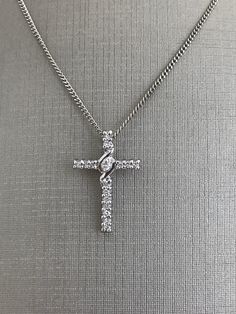 14 Karat White Gold Medium Size Cross with Diamonds and Chain For Her 18 inch chain length 2.8 grams Cheap White Cross Jewelry, Luxury White Cross Necklace Elegant Style, Luxury Classic Diamond White Cross Necklace, Luxury Brilliant Cut Diamond White Cross Necklace, Elegant Cross Pendant Necklace With Silver Chain, Elegant Silver Chain Cross Necklace, Elegant Necklace With Silver Chain And Cross Pendant, Elegant Cross Chain Necklace With Adjustable Chain, Curb Chain Pendant Necklaces For Anniversary