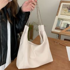 Specification: Material: Pu leatherSize: 31*20*9 cm Color: White,Black Usage: Shoulder Bag, Handbag [23y 9m 15d] Everyday Casual Satchel With Chain Strap, Casual Everyday Satchel With Chain Strap, Daily Use Faux Leather Shoulder Bag With Chain Strap, Faux Leather Bag With Chain Strap For Everyday Use, Everyday Faux Leather Bag With Chain Strap, Daily Faux Leather Shoulder Bag With Chain Strap, College Tote Bag, Casual Handbags, Tas Bahu