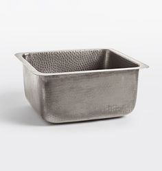 a square metal container on a white background