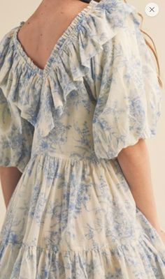 Ruffled v-neck dress with ruffle trim detail, elbow length bubble sleeves and tiered seams and pockets. True to size, I am an 8/10 wearing a medium. Small 4-6Medium 8-10Large 12-14 Blue Floral Short Sleeve Dress With Ruffles, Blue V-neck Dress With Ruffles, Summer Floral V-neck Dress With Ruffles, Blue Ruffled V-neck Dress, Feminine V-neck Ruffle Dress With Floral Print, Church Fits, Trim Detail, Ruffle Trim, V Neck Dress