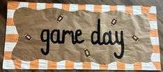 a paper bag with the word game day on it