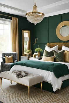 a bedroom with green walls and gold accents