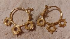 Byzantine earrings, 6th century AD, or as they are some times called Byzantine Ear Pendants. They are gold plated Pewter.  Minimal wear to the gold finish on some of the high tips of metal but in fantastic condition for earrings from the 1950s. These earrings have three double sided decorative wheel designs.  Similar earrings can be seen in the Brooklyn Museum.  https://www.brooklynmuseum.org/opencollection/objects/17469 Very lightweight and 2.5 inches in length. High Tips, Byzantine Earrings, Brooklyn Museum, Air Force Base, Egyptian Jewelry, Pierced Earrings, Jewelry Earrings Hoops, Earings Piercings, Favorite Things Gift