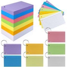 several colored sticky notes are stacked on top of each other