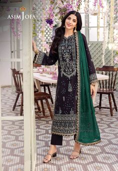 Shirt: Boski Silk By Pcs: 3 Pcs Trouser: Boski Silk Dupatta: Chiffon Color: Black Product Details Experimenting with a bold combination of jet black & emerald green dressed in this unique design Mawra Hocane nails this look to perfection. Shirt is embroidered with gold zari & holographic emerald sequins with threads giving it a look of scattered constellations across a clear night sky. The shirt comprises of an allover embroidered pattern with heavy hem borders & a neckline. The contrast emerald Wedding Dress Indian, Pakistani Dresses Party, Mawra Hocane, Salwar Kameez Pakistani, Dress Party Wear, Wedding Dresses Indian, Asim Jofa, Party Wear Dress, Emerald Green Dresses