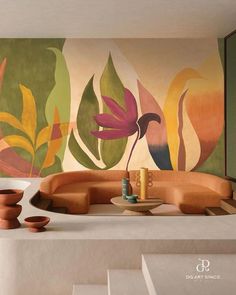 an artisticly designed living room with colorful wallpaper and artwork on the walls, as well as vases