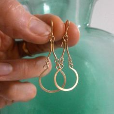 "Small Gold Teardrop Earrings Open Circle Drop Earrings ~ Gold hammered open circles float beneath curved links creating exotic dangling teardrop hoops. Lightweight and very wearable, they're perfect if you can't wear anything heavy and the gold fill French wires make them suitable for even the most sensitive ears.  I make this Arabesque Hoop Earring in 3 sizes, the last three photos show in order, the smallest to largest. Each size has a unique look. The small will add a little glimmer to your Earring Dangling, Matte Gold Jewelry, Hammered Wire Jewelry, Jewelry Hoops, Wig Jig, Gold Teardrop Earrings, Earring Small, Small Gold Hoop Earrings, Wire Earring