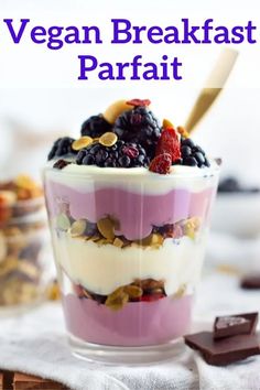 an image of a dessert with berries and yogurt in the background text reads vegan breakfast parfait