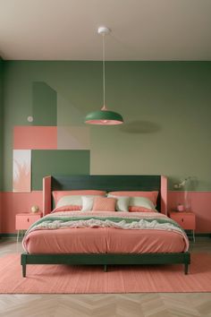 a bedroom with green, pink and white colors on the walls is pictured in this image