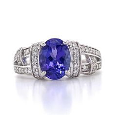 18k White Gold Oval Cut Tanzanite And White Round Diamond RingRing Size 7.25 4.9 Grams  Round White Brilliant Cut Diamonds 0.3 Carats Total Weight Clarity: Si2-I1 Color: H 1 Oval Cut Tanzanite 8.4x6.25mm This is a stunning tanzanite ring. It is a stunning look that would look great on any finger. if you have any questions or concerns please message me and I will get back to you as soon as possible. serial number: Aj05394 A Oval Tanzanite Blue Rings, Luxury Oval Tanzanite Jewelry, Formal Tanzanite Diamond Ring, Oval Shape, Silver Oval Tanzanite Gemstones, Silver Tanzanite Oval Gemstones, Blue Tanzanite, White Diamond Ring, Tanzanite Ring, 3 Carat