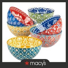 four colorful bowls with designs on them and the words macy's written below it