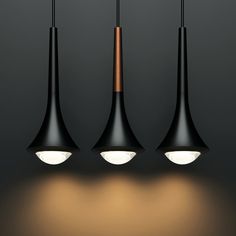 three black lamps hanging from the ceiling with dim lights on each one and two different shades