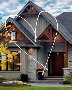 a house with a heart drawn on the front