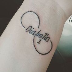 a small wrist tattoo with the word wafflefo written in cursive font