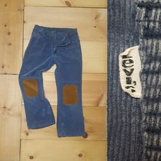 "Vintage 1970s Levi's bell bottom jeans. Soft faded navy blue corduroy with brown wide wale corduroy knee patches. Natural rise and zipper fly with a little flare below the knee. Unisex. Maker: Levi Strauss & Co. Talon zipper. Fabric: cotton blend. Freshly laundered. Size: they measure 30\" around at the waist (i.e. 16\" measured flat) with a 10.5\" front rise. They measure 40\" around at the hips (i.e. 20\" measured flat across). The inseam measures 28\" and the outseam measures 37\". The l Wide Wale Corduroy, Stand Studio, Surf Tee, Blue Corduroy, Knee Patches, Bottom Jeans, Fringe Sweater, Bell Bottom, Levi Strauss & Co